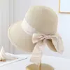 26 Años de Nuevos Estilos: Sombrero de Paja con Lazo de Cinta Estampado Off-White y Ala Ancha, Estilo Coreano Primavera y Verano, Estilo Ligero y Maduro, Transpirable y No Sofoca