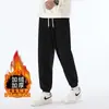Pantalones de chándal de pana de peso pesado para otoño e invierno para hombre, pantalones casuales de retazos, pantalones jogger holgados para hombre con forro polar y diseño engrosado