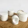 Venta al por mayor del fabricante Botella de Crema de Porcelana Blanca 1 oz 2 oz Botella de Cosméticos de Jade Blanco Botella de Cáñamo Botella de Vidrio para Crema Facial
