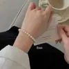 Pulsera de Perlas Gama Alta Retro para Mujer Gama Alta Lujo Ligero Perlas Redondas Perlas Lisas Elegantes Temperamento Simple Más Vendido Versátil para Mujer
