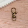 Fornecimento de Fivela Boca de Peixe de 3 Pontos, Acessórios de Fivela para Bolsa, Mosquetão com Mola, Chaveiro Galvanizado Dourado e Prateado, Fivela para Cão em Liga de Zinco