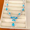 Exquisito conjunto de pendientes y collar de gota de agua con incrustaciones de circonita estilo palacio, cadena para la clavícula de lujo ligero de alta gama, elegante juego de joyería para mujer