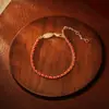 Nuevo Pulsera Tejida de Buena Suerte Estilo Chino con Chapado de Cobre Oro Real de 18K, Hilo Rojo Pequeño, Sensación Moderna y de Alta Gama, Pulsera Festiva de Año Nuevo para Mujeres