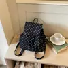 Mochila de lunares de estilo coreano, moderna, femenina, de nicho, para mujer, versátil para el día a día y para ir a la escuela, mochila pequeña y ligera