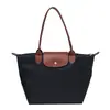 2026 Nova Bolsa Tote de Grande Capacidade para Mulheres Nylon para o Dia a Dia Bolsa de Ombro Único Versátil Bolsa de Mão Moda Simples Toque de Luxo