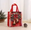 Bolsas de tela navideñas transfronterizas, bolsas de regalo, bolsas de tela temáticas de Santa Claus, bolsas de tela de Nochebuena, bolsas de tela coloridas de tela no tejida, en stock