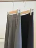 Falda midi lisa de estilo minimalista francés en línea A para mujer, nueva colección de otoño, de cintura alta, corte holgado y favorecedor