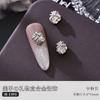 Manicura pila caja de regalo de joyería de diamantes con garra aleación diamante amor rojo intermitente Año Nuevo uña metal accesorios de diamantes