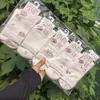 Meias Casuais Femininas Longyixiang de Cano Médio Brancas Fofas Versáteis de Algodão Branco Estilo College 26 Novo Modelo Outono/Inverno