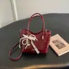 Bolsa de balde estilosa transfronteiriça bolsa de mão feminina bolsa pequena 2026 nicho nova estilosa casual para o dia a dia bolsa transversal