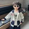 Chaqueta con capucha para niño Primavera y Otoño 2026 Nueva Moda Infantil Fresca de Manga Larga Atuendo de Otoño Top Casual Deportivo para Niño