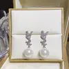 Estilo Francés Estilo Zirconia Letra Perla Pendientes Pendientes para Mujer Aguja de Plata S925 Elegante Lujo Ligero Famosos Pendientes Versátiles