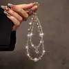 Nueva Cadena para Teléfono Móvil Cadena Colgante de Cristal Diseño de Gama Alta Pequeño Nicho Sentido del Diseño Exquisito Correa Colgante de Muñeca para Mujer Accesorios para Bolsos