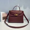 Bolso Tote de Cuero Genuino de Gran Capacidad Nuevo de Otoño Hebilla de Cuerda Metálica de Nicho Bolso Cruzado de Hombro Tejido para Mujer