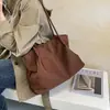 Bolso tote minimalista de estilo coreano con un aire relajado, color liso, nueva colección otoño 2026, gran capacidad, adecuado para el trabajo y los desplazamientos, bolso de hombro o bolso de axila