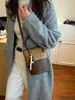 Moda de Comercio Exterior Retro Bolso Pequeño para Mujer 2026 Nuevo Invierno Versátil Bolso Cruzado de Hombro de Gama Alta Tipo Cubo de Moda