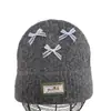 Gorro de punto estilo coreano, mezcla de lana, inspirado en la dopamina, con un lazo, diseñado para mujeres, que proporciona calidez y protección para los oídos en otoño e invierno, adecuado para estudiantes