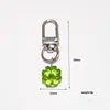 Colgante de Trébol de la Suerte de Cuatro Hojas con Agujero Recto Más Vendido Transfronterizo, Accesorio de Llavero Creativo para Bolsos de Chica a la Moda