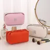 Bolsa de Maquiagem Feminina Portátil Alta Classe 2025 Nova Super Quente Portátil Grande Capacidade Cuidados com a Pele Ins Bolsa de Higiene Pessoal Bolsa de Armazenamento