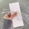 Óculos modernos com mudança de cor e anti-luz azul para homens, armações de óculos retrô estilosas de metal com meia armação, óculos planos personalizados de comércio exterior transfronteiriço