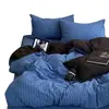 Juego de ropa de cama de cuatro piezas de algodón puro estilo Muji sábana de algodón funda de edredón rayas blancas y negras sensación de lujo ligero alta gama ropa de cama juego de tres piezas para dormitorio