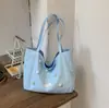 Bolso grande de gran capacidad y ligero para mujer, nuevo modelo de verano 2026, bolso de mano casual de moda para la escuela y el trabajo, bolso de hombro grande