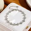 Pulseira de strass branco transfronteiriça com diamantes coloridos, toque de luxo leve e alta qualidade, estilo de moda europeu e americano, pulseira feminina de alta qualidade atacado