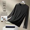Camiseta casual versátil de manga comprida para outono para homens, gola redonda, cor sólida da moda, confortável, respirável e com caimento solto