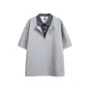 Yidao Vintage 2026 Verano Nuevo Retro Americano Moderno Cuadros Falso Dos Piezas Patchwork Cuello Polo Holgado Manga Corta
