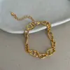 Pulsera de Metal Trenzado Ovalada Hueca Inspirada en Diseño Retro para Mujer, Accesorio de Moda Único y Moderno