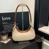 Bolso tejido a mano informal estilo coreano nuevo, moderno y versátil para vacaciones en la playa, bolso de axila tejido retro simple