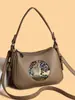 Nova Bolsa Feminina da Moda Transfronteiriça Primavera 2026 com Relevo de Elefante, Grande Capacidade, Versátil para o Dia a Dia, Bolsa de Ombro Cruzada Macia Estilo Retrô