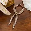 Collar retro de tela con estampado de leopardo y flores, diseño moderno y minimalista, cadena de clavícula única, lujo ligero, joyería de alta gama para mujer