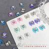 Joyería Popular al Por Mayor para Arte de Uñas, Moño Aurora Transparente como Hielo, Moños Coloridos Corazón de Durazno, Accesorios de Decoración de Uñas Diamante Corazón