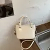 Bolso cubo de moda y sencillo para mujer, gran capacidad, nuevo de la primavera 2026, elegante estilo vintage, para el trabajo y los desplazamientos, bolso de hombro