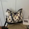 Bolsa de lunares con lazo súper popular del verano para mujer, nueva bolsa versátil para el hombro o debajo del brazo 2026, bolsa casual de doble hombro para el día a día