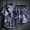 Comércio exterior à vista camisa floral havaiana masculina manga curta solta tamanho grande conjunto de praia casal estilo Hong Kong retrô moderno shorts