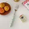 Estilo Ins mango de perla cerámica acero inoxidable cuchillo de chef tenedor cuchara vajilla de té de la tarde socialité cuchara de servir de restaurante de alta gama