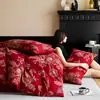 Juego de cuatro piezas de jacquard de doble capa de gasa teñido en hilo de algodón de alta gama para boda en rojo, sábana y funda de edredón de algodón puro, ropa de cama para boda
