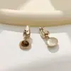 Aretes de Ojo de Tigre con Diseño Vintage, Aretes Colgantes Ovalados Color Café Dorado, Estilo de Nicho, Aros Versátiles para el Día a Día