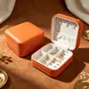 Caja de joyería portátil directa de fábrica con espejo, caja de joyería de lujo de alta gama, caja de almacenamiento de pulsera de cristal, collar, pendientes al por mayor