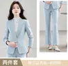 Venta al por mayor transfronteriza de atuendos profesionales nuevos de otoño e invierno: conjunto de dos piezas de moda: chaqueta blazer azul de manga larga y pantalones acampanados para mujer