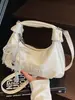 Bolsa de Mão de Couro Encerado a Óleo de Moda Coreana Feminina 2025 Nova Nicho Commuter Moda Elegante de Alto Valor Bolsa Transversal