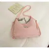 Nova Moda Primavera/Verão 2026 Luxo Leve Bolsa de Ombro Único para Comutar sob o Braço Grande Capacidade Temperamento Elegante Corrente de Pérola Estudante