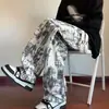 Pantalones holgados tie-dye únicos para hombre, primavera y otoño, estilo americano, pantalones de chándal versátiles, pantalones deportivos geniales y elegantes de alta costura para adolescentes