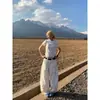 Jeans para mujer de diseño retro americano de alta costura 2026, lavados en blanco, tiro alto, corte curvo, pantalones anchos holgados de nicho