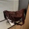 Bolso vintage de nicho con estampado de leopardo para otoño e invierno para mujer 2025 nuevo casual versátil marrón moderno para el trabajo bandolera tipo albóndiga