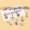 Cruz nueva de gran venta serie Harry Potter cuentas aleación DIY pulsera collar accesorios paloma mensajera periférico al por mayor