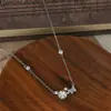 Cadena Clavicular de Zirconia Galvanizada en Oro Real para Mujer, Diseño de Nicho, Collar con Pétalo de Concha Natural y Mariposa, Venta al por Mayor