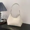 Bolso Cruzado de Hombro Único con Colgante Texturizado Color Sólido Casual Estilo Coreano Verano 2026 Nuevo Elegante Bolso Dumpling para Mujer